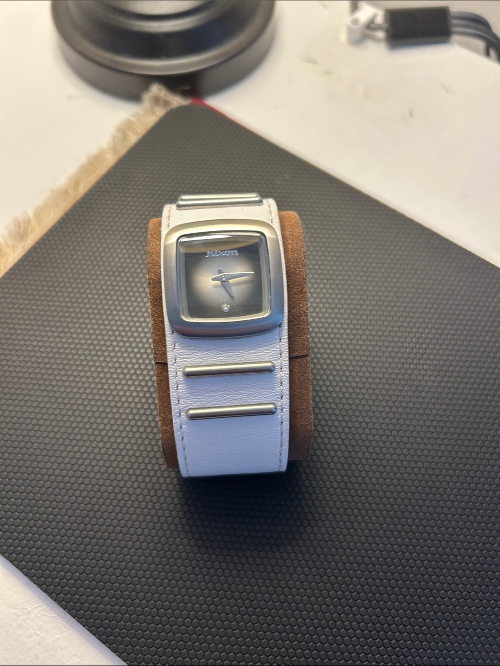 Nixon Men's Silver Case Watch with White Leather Strap